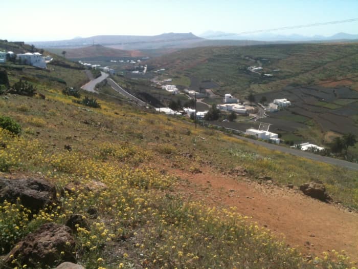 Looking back down the Los Valles Climb Towards Teguise and the Castillo Santa Barbara atop Guanpay in the distance.. The Los Valles Climb features in the Ironman Lanzarote Bike Course