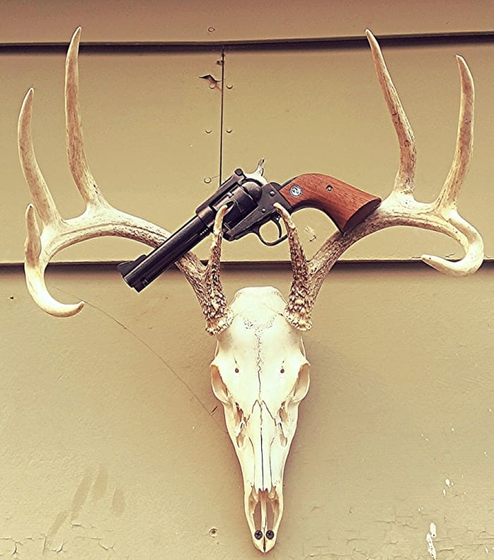 Shot of the bleached skull and rack of the white tail shot with the 125gn HP. I by no means recommend the 32 mag as a deer hunting round. This was just a opportunity that presented itself, and I took it.