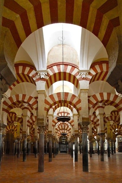 Interior of an Islamic mosque. Rather than showing depictions of prophets and people, Islam tends to use patterns and quotes from the Koran for decorating its religious sites.