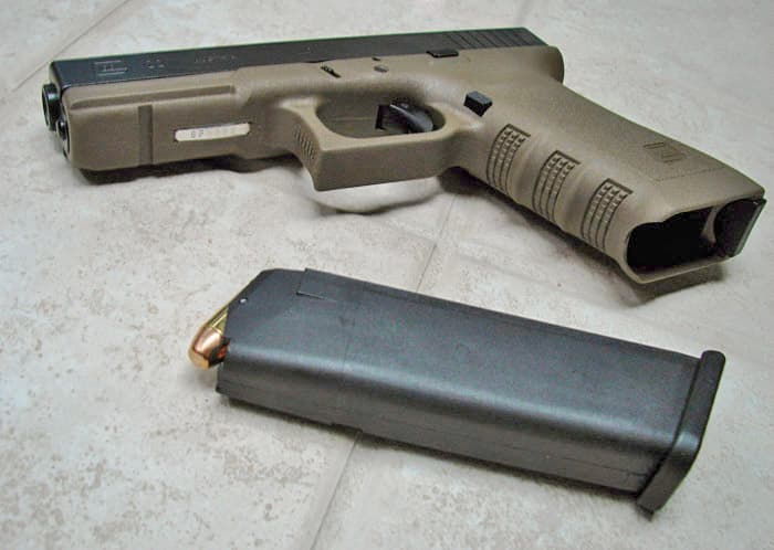 The Glock's Polymer Frame Can Be Molded In Special Colors. Note the Reinforced Polymer Magazine