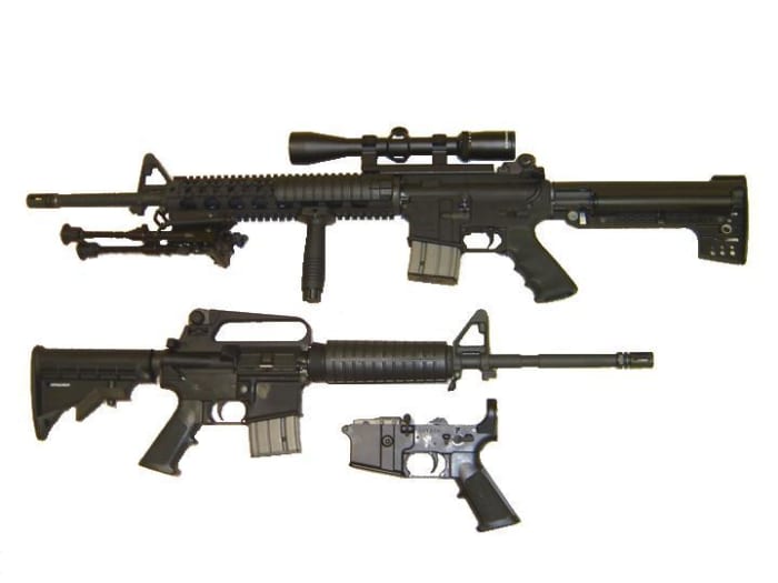 AR with after-market fixed stock (top) and M-4 type adjustable stock (bottom).