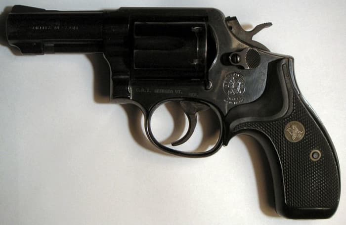 Author's choice for best all-round carry revolver: fixed sight, 3-inch S&W K-Frame such as the stainless Model 65 or blued Model 13 (shown). Note full-length ejector rod and compact grips.