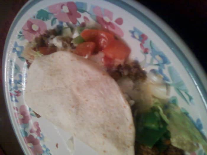 A soft taco including ground beef, cheese, tomatoes, lettuce, green peppers and onion. This whole taco can go right into the blender for an easy, tasty, blended meal.