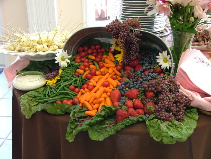 By eating plenty of fruits and vegetables, you are replacing hi fat, hi cholesterol foods, with low calorie nutritious foods.