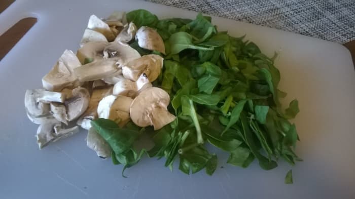 Spinach (pictured with chopped mushrooms) is high in glycoglycerolipids which have anti-inflammatory and anti-oxidative effects on the body