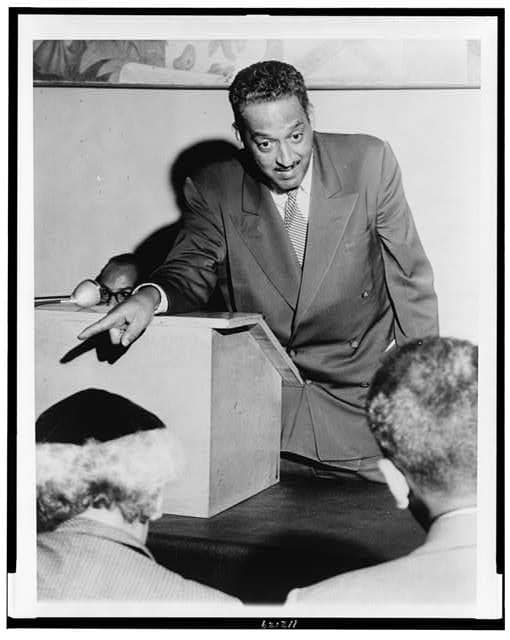 Thurgood Marshall, lead counsel on the case, explains segregation to the press. He went on to become the first African-American on the Supreme Court.
