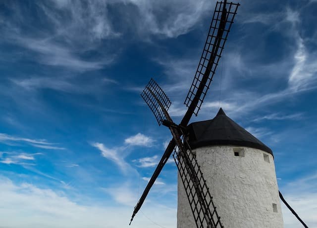 A traditional windmill. Utilizing wind power i not a new thing, such mills were a common sight before the onset of full industrialization and fossil fuel power. Modern technology can be used to harness wind energy more efficiently now, however.