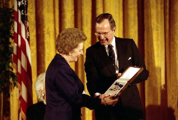 1991. U.S. President George H. W. Bush awards former U.K. Prime Minister Margaret Thatcher with the Presidential Medal of Freedom, the highest civilian honor awarded by the United States.