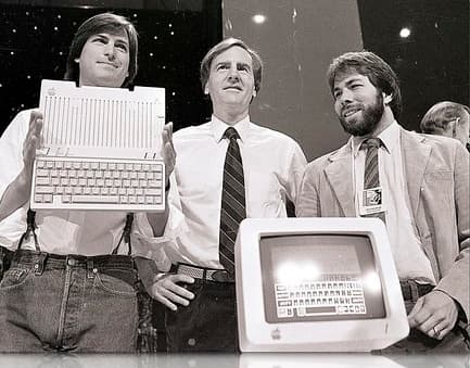 John Sculley (centre) flanked by Apple creators Steve Jobs (left) and Steve Wozniak (right).