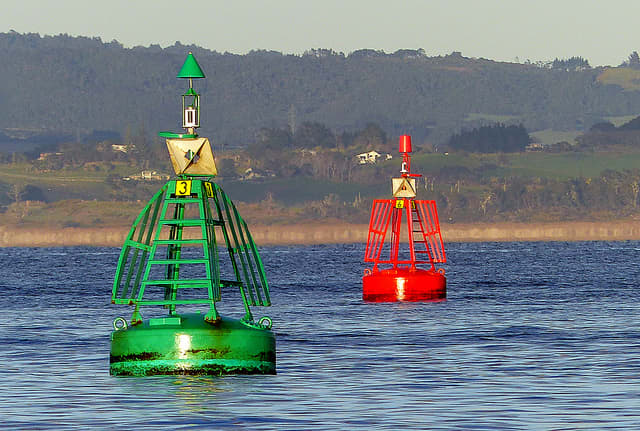 Channel marker buoys; remember the three Rs" Red to Right Returning