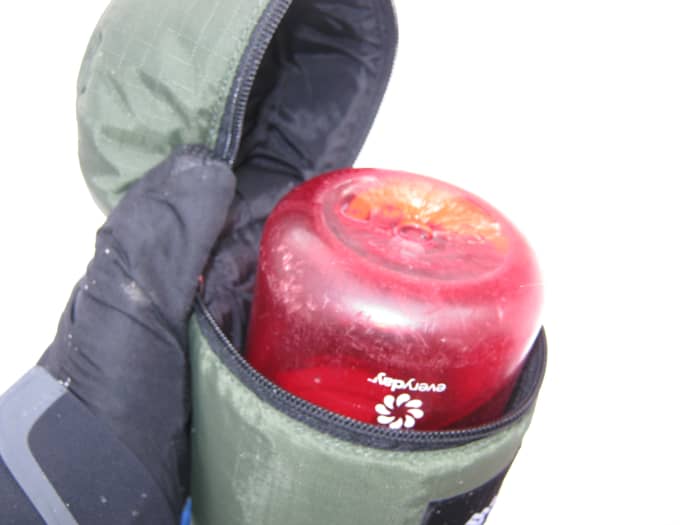 The water at the top of a bottle freezes first, so carry bottles upside down so the cap doesn't freeze shut.