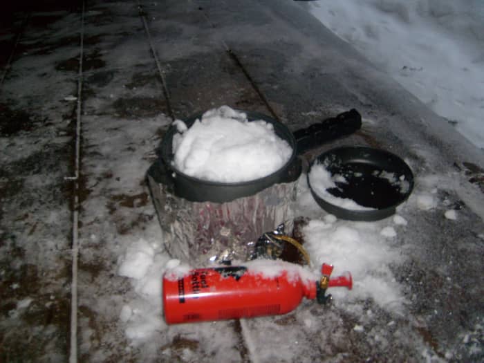 Melting snow to make water is a laborious and time consuming activity for winter backpackers.