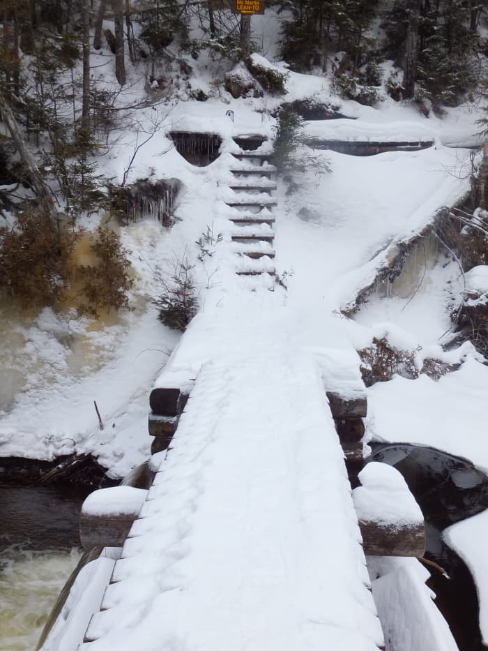 The snowy dam on Lake Colden - that ladder is fun to climb while wearing snowshoes.