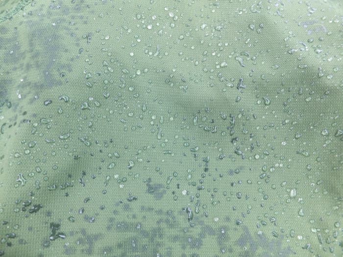 As the rain begins to fall, rain droplets bead up on this shirt from Mountain Hardwear.