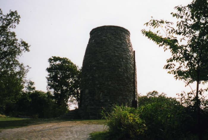 The original Washington Monument built in 1827 stands along the Appalachian Trail in Maryland. The AT encounters many historical structures along its route.