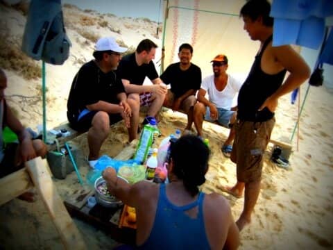 While waiting for the fishermen to come back with their Red Sea catch, these guys were either busy yakking or preparing the ingredients to make our sushi!