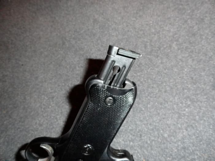 The Magazine release on this gun is a little funky, you have to pull the lever back until the magazine pops out. It is not drop-free and barely pops out, but that's fine as you are unlikely to need a quick mag change with this gun.