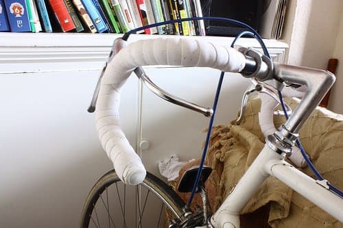 See what errors your can spot with this bar tape wrap? The right side bulges out as though not tightly wrapped and the symmetry is shockingly bad.