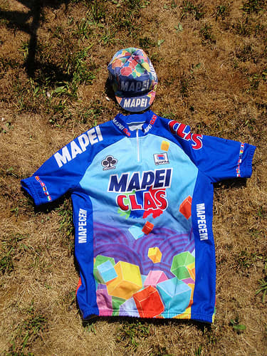 The unique colours of the Mapei cycling jersey added a touch of vitality to the Tour De France Peloton