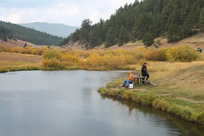 Fellows fishing at Slough Pond near the trail head for Beaver Trail at Golden Gate Canyon State Park.