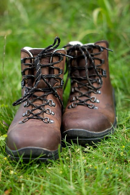 A good pair of hiking boots will keep your footing solid and your ankles safe