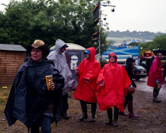 Plastic ponchos keep you dry, and fold up into a small package when not in use