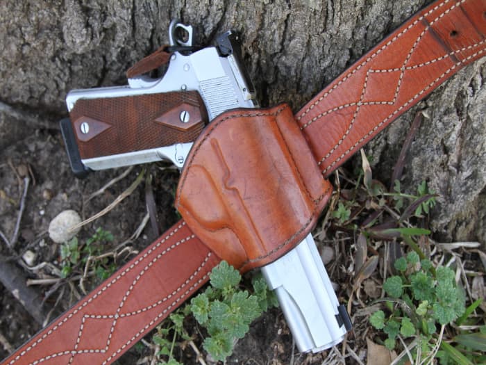 With the right leather and clothes, a full size service pistol, like this .45 cal., M1911, carries like a much smaller, less effective gun.