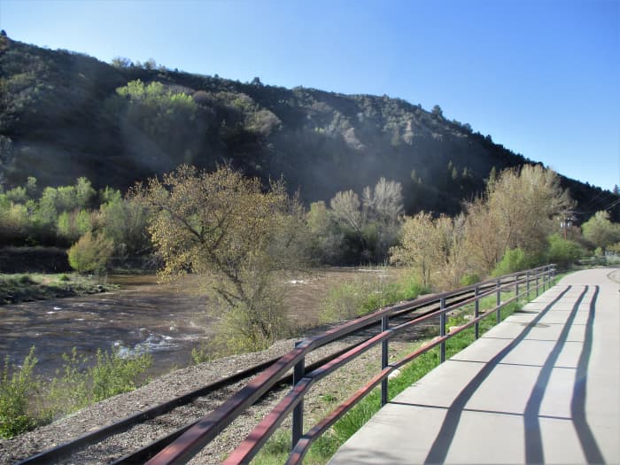 This paved concrete ribbon follows the Animas River for several miles and is popular with both walkers and bikers, photo by author