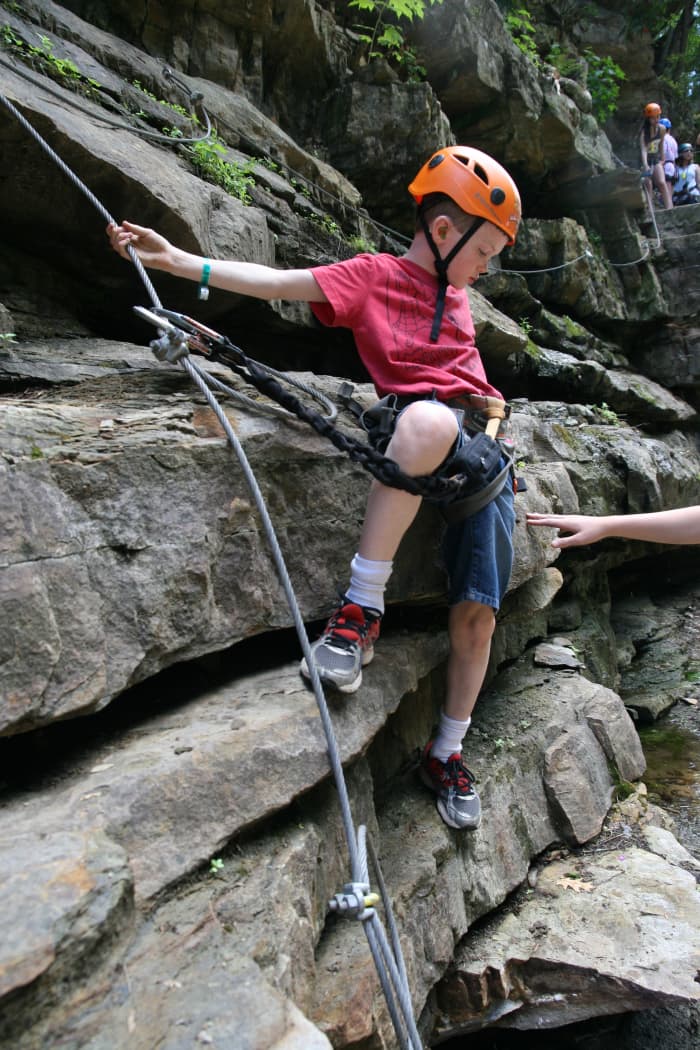 Steel cable and carabiner harnesses allow almost anyone to scale cliff faces and get a unique view of nature.