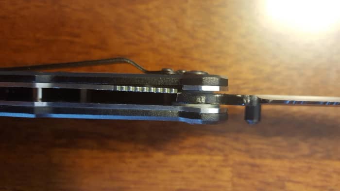 The BlizeTec Tactical Survival Knife's liner-lock; if you open it, without an aggressive flick of the wrist