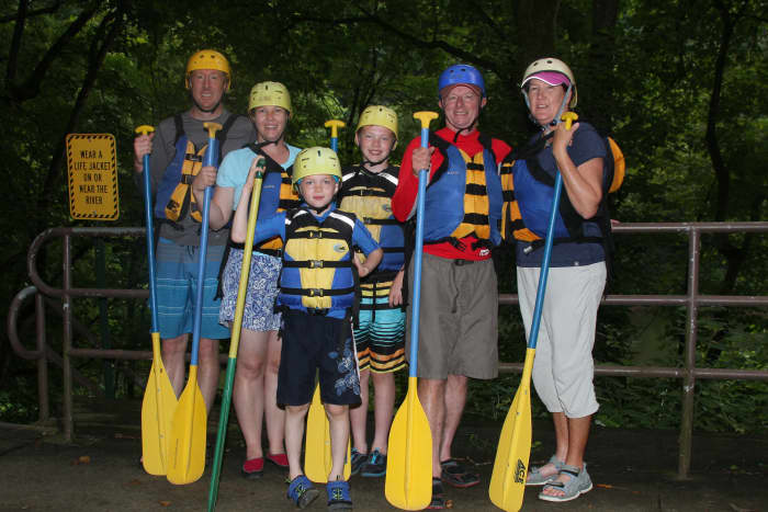 The entire family was outfitted with helmets, tight-fitting life preservers, and paddles. The life preservers must be very secure so the jacket doesn't slip off during rescue attempts in the event someone is thrown from the raft.
