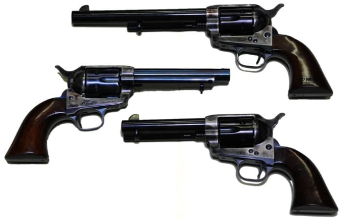 Colt Model 1873 Army (top) and two 1873 civilian models with different barrel lengths.