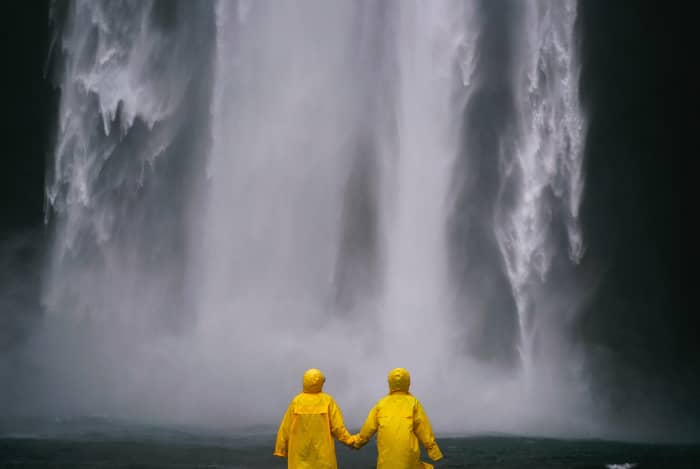 For most regions, it's wise to have some kind of rain protection. Even if it's just a lightweight emergency poncho that takes up almost no space in your pack.