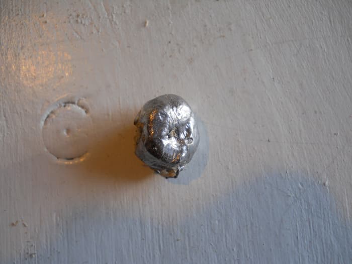 180 grain Winchester Power Point used in previous .300 WSM test and recovered from green pine round. Fired at 10 yards, bullet shows textbook expansion and retained 90% of its weight.