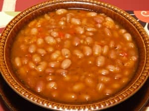 Having trouble getting kids to eat their beans? Add some cut-up hot dogs to the mix!