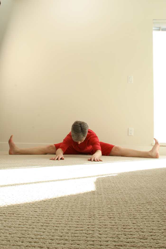 Come forward into the pose as far as feels comfortable. Some women prefer to bring hand on hand under their forehead and rest on the seat of a chair for a gentler variation.