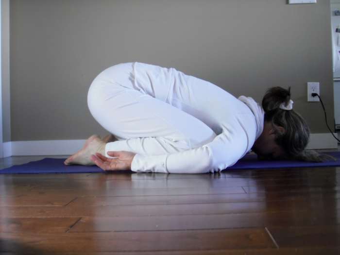 Keep the toes together and bring the knees apart to make room for your baby and room to breathe.