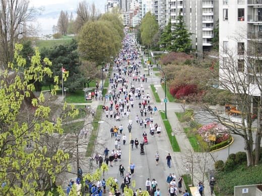 Walkers in the Vancouver Sun Run, a 10km run or walk that can be either competitive or non-competitive, depending on a person's goals.