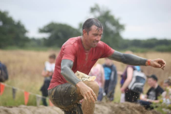 As clothing gets soaked it takes in water and extra weight you have to carry with you through obstacle events.