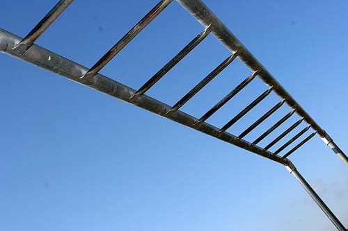 The imposing monkey bars are arguably the toughest obstacle at a Spartan Race, and finding some local to you can help add specificity to your training.
