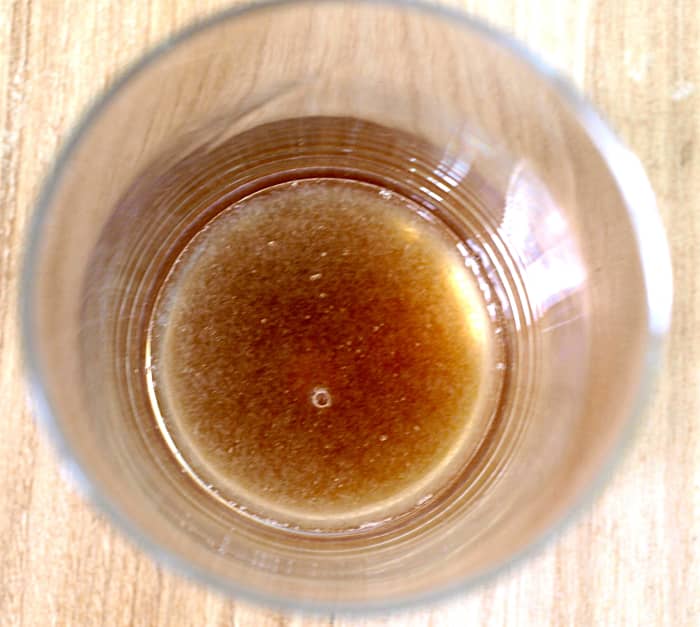 Then add the Grade B maple syrup. You can also use a higher grade of syrup—the general rule is the darker, the better, as it will have more minerals.