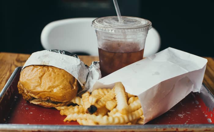 The same unhealthy foods - meat, cheese, dairy and processed junk food - that contain cholesterol also contain saturated fat and trans fat.