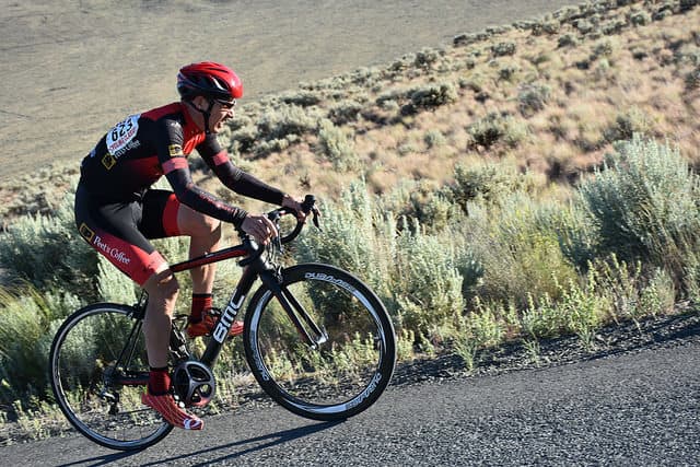 Biking up hills is a good way to build more muscle.