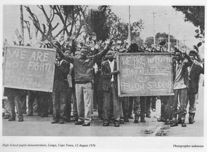 Students in June 1976 demonstrating against Afrikaans and were in a peaceful mode and holding their placards.