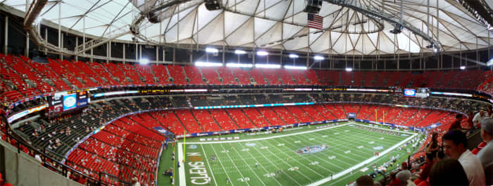 The Georgia Dome in Atlanta uses a Teflon-coated fiberglass as a permanent roofing material. The fabric was originally developed for astronaut uniforms.By Latics (Own work) via Creative Commons.