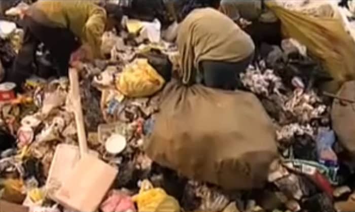 Impoverished millions eke out a living by scavenging for scraps amidst the mountains of garbage generated by polluted, overpopulated cities.