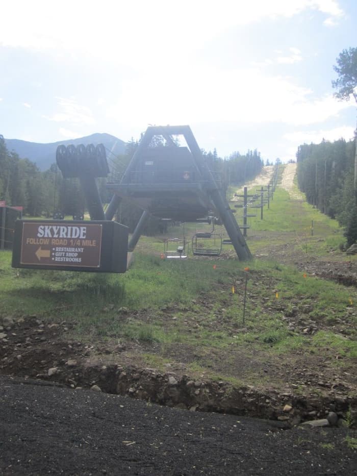 The ride, beginning here along Snowbowl Rd, is about 25 minutes each way. Tickets are available at the lodge. See the peak is in the distance.