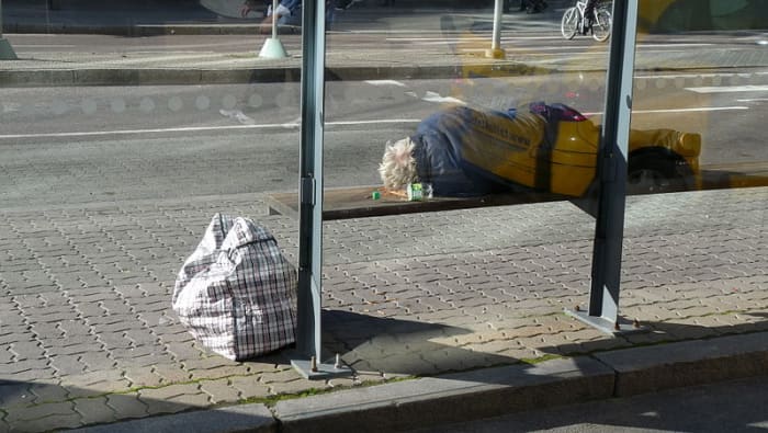 Sleeping on benches and keeping a public routine may indicate homelessness or simply a lack of good transportation options.