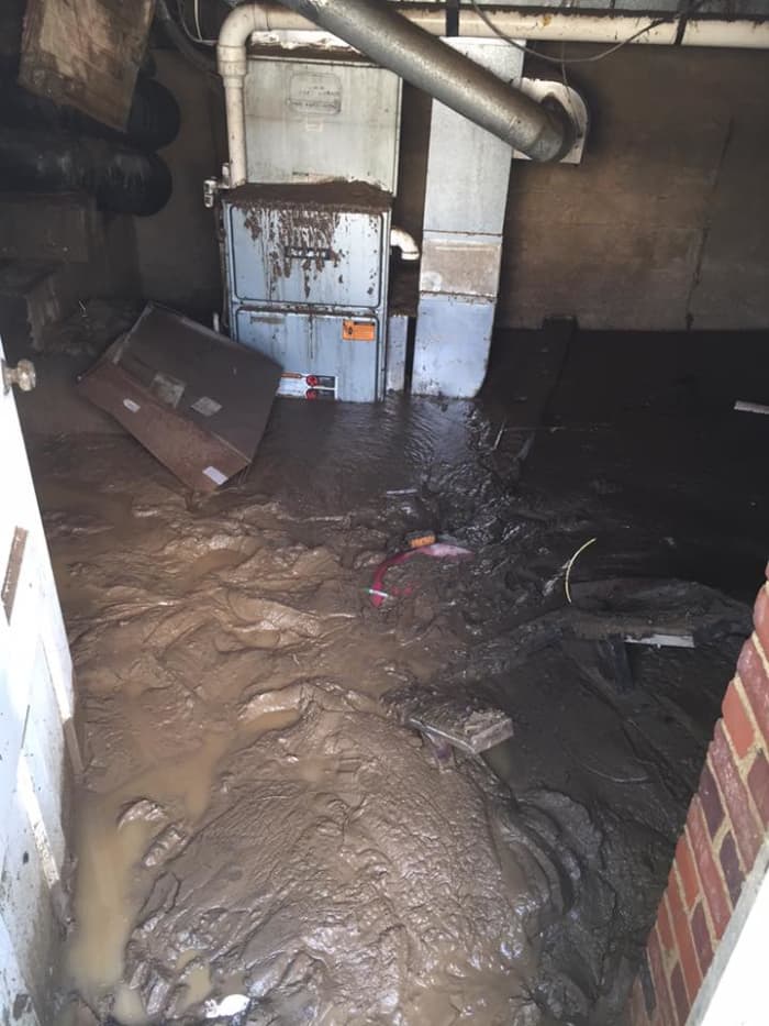 The water that decimated homes is almost unfathomable. The amount of mud left behind after the water receded is a glaring reminder of the struggles ahead.