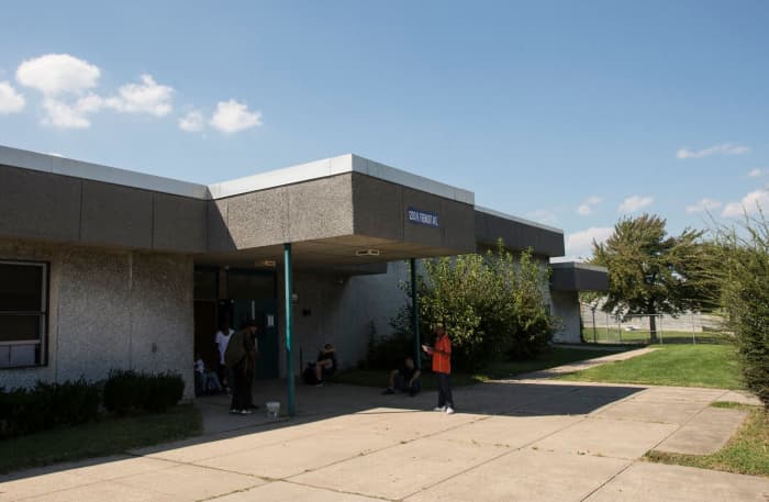 A view of the entrance to the school building housing the community of Tent City West